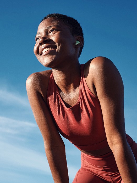 Lady smiles outdoors