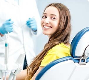 Smiling woman in dental chair