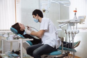 Dentist in Rock Hill performing routine services. 