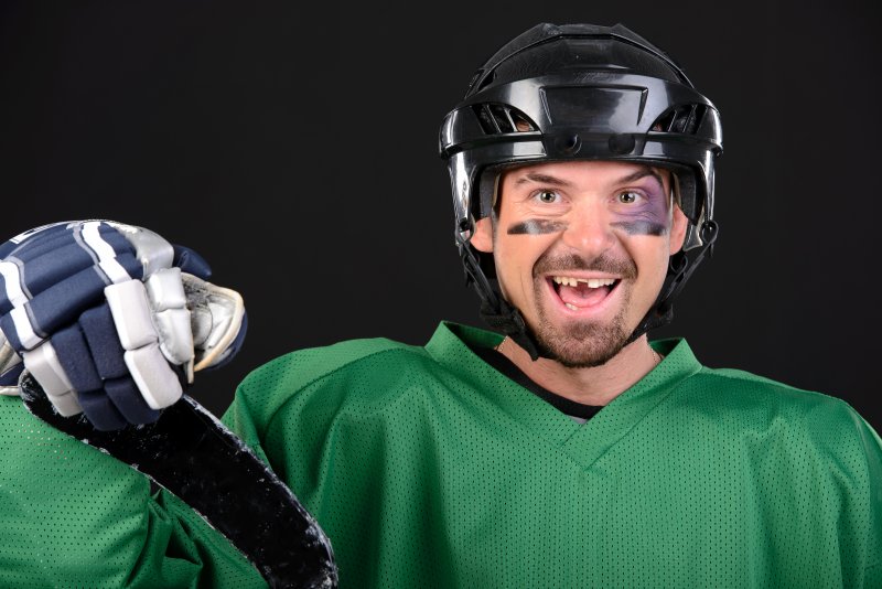 A hockey player with a chipped or missing tooth