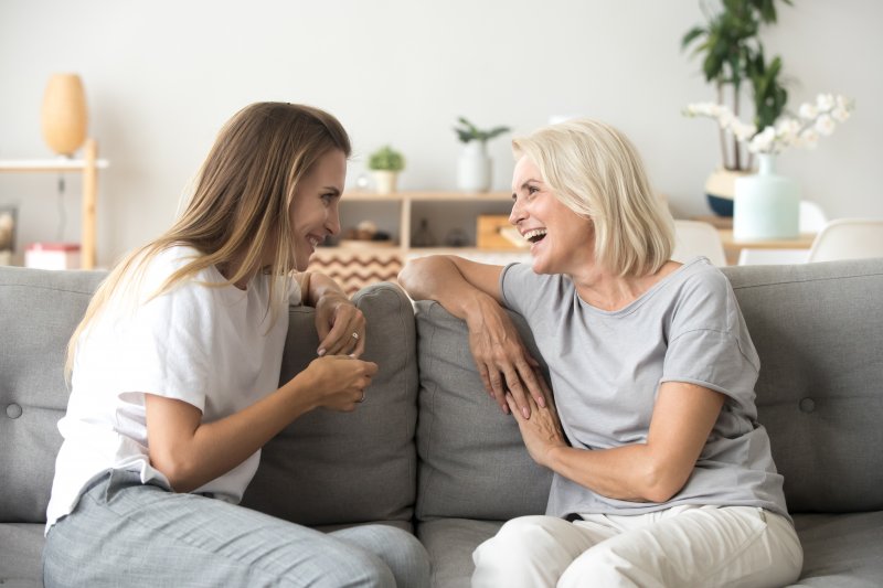 Ladies converse on couch